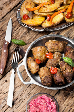 beef roulades in a metal bowl