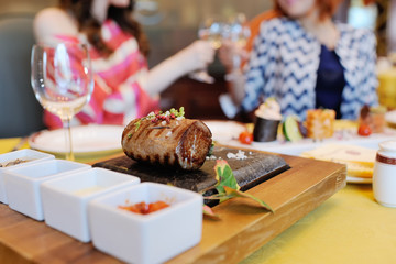 a delicious piece of meat on a stone closeup