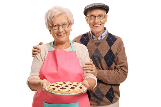 Senior couple with a freshly baked pie