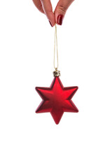 Red christmas tree decor in form of star with sparkles
