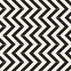 Seamless vector pattern. Abstract geometric lattice background. Rhythmic zigzag structure. Monochrome texture with chevron lines.
