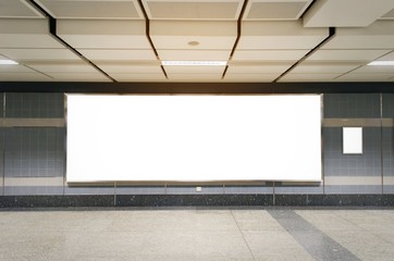 mock up blank billboard with copy space for advertising or media and content marketing at train station, marketing and advertising concept