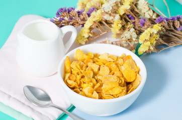 Corn flakes in a bowl with spoon for eating in the morning,breakfast or meal