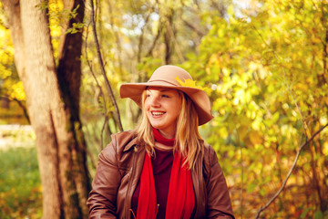 Young woman  in an autumn park.