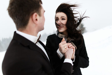 Wedding winter, bride and groom walking at winter wedding day