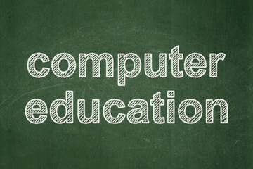 Obraz premium Education concept: Computer Education on chalkboard background