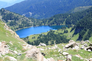Fototapeta na wymiar Pyrenean lake in Ariege. Occitanie in South of France