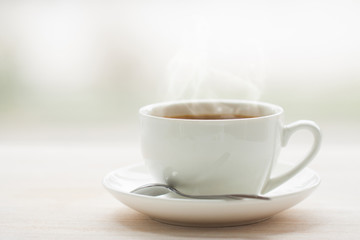 cup of hot steaming coffee