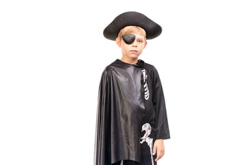 Studio portrait of little boy in Halloween costume against white background
