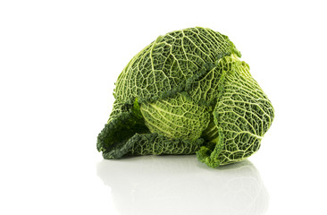 green savoy cabbage on white