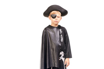 Studio portrait of little boy in Halloween costume against white background