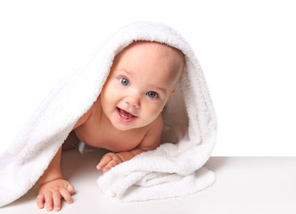 Baby in towel isolated.