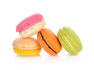 French colorful macarons isolated on a white background
