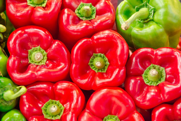 Pile of red and green peppers