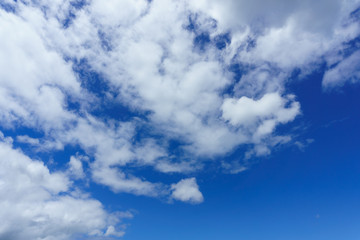 blue sky with clouds background. nice cloud formation over the clear sky. Beautiful and Amazing azure sky with clouds and sunshine for background