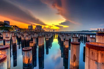 True tilt shift view of abandoned Concrit  poles from fencing in the sea ,waterfront City,Johor Bahru,Malaysia © hamdie