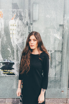 Portrait of young woman, outdoors