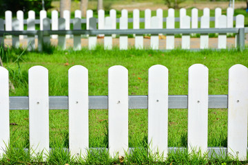 White fence around the lawn.