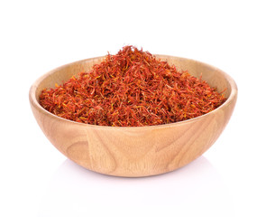 Safflower in a bowl on white background