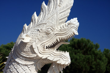 White statue of the asian dragon