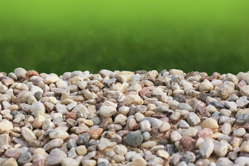 A pile of stones against the background of grass