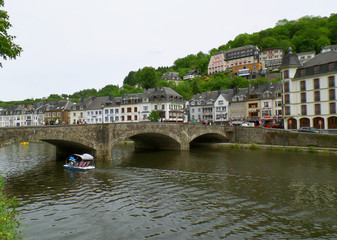 Vintage old stone bridge over the Semois river, Bouillon, Belgium 