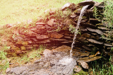 Artificial Waterfall . Decorations in the garden.