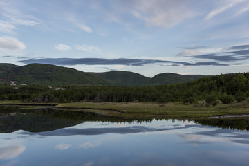 Scenic view of river with mountains in background, Margaree River, Cabot Trail, Cape Breton Island, Nova Scotia, Canada