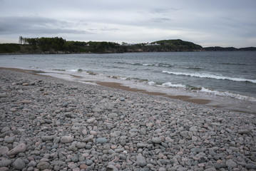 Scenic view of pebbles on beach, Cabot Trail, Cape Breton Island, Nova Scotia, Canada