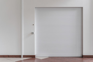 Shutter door or rolling door white color, in the new shopping center