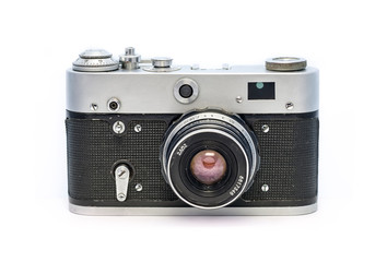 Analog soviet camera FED isolated on white background. Old dusty retro film photographic equipment.