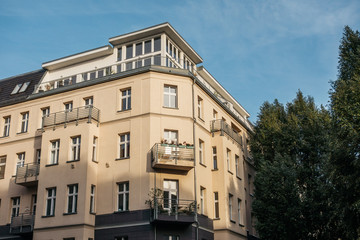 orange corner building in the heart of berlin