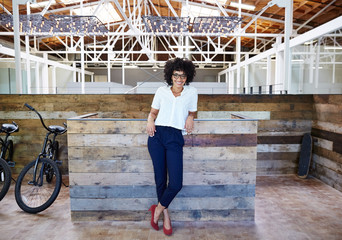 Portrait of millennial businesswoman at office