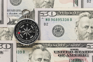 Compass and dollar