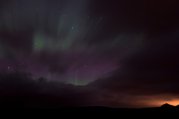 Fototapeta na wymiar Northern Lights Dancing with Stars in Iceland
