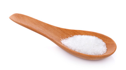 Fototapeta na wymiar sea salt in wooden spoon isolated on white background
