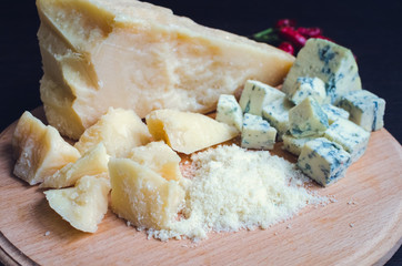 Grated Parmesan and sliced Blue cheese