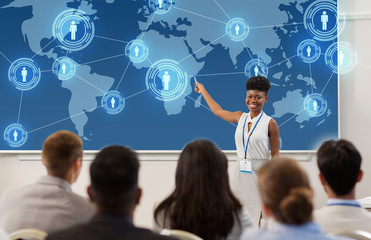 group of people at business conference or lecture