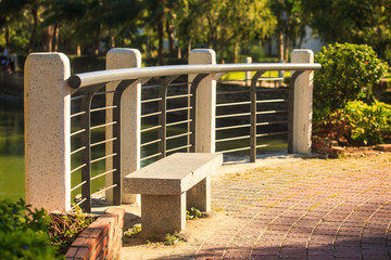 Stone Bench Barrier by Sports Ground in Resort City Park