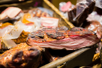 smoked meat products at market or butcher shop
