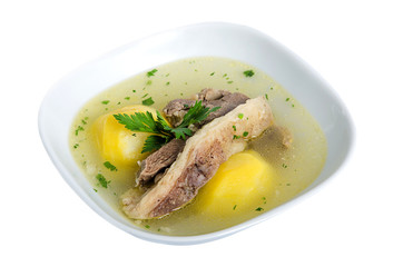 Buhler - Soup with meat and potatoes isolated on white