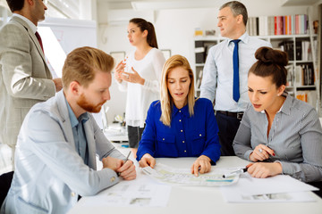 Businesspeople collaborating in office