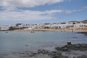 Lanzarote, Spain - August 26, 2015 : Tourists sunbathing and swimming in 