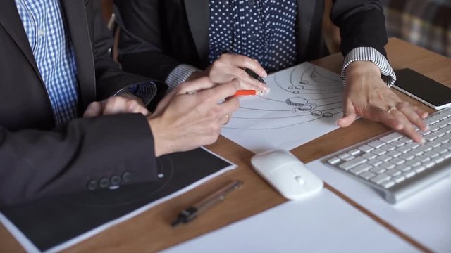 A team of engineers discussing a flight into space