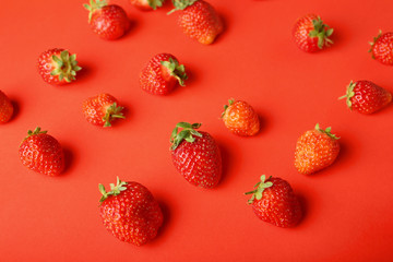 Strawberries on red