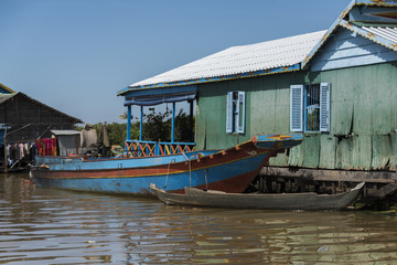 Fototapeta na wymiar Rowboat in Tonle Sap lake, Kampong Phluk, Siem Reap, Cambodia