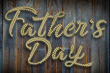 Father’s Day Light bulb style , Disco style on old wood planks background.