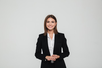 Portrait of pretty smiling businesswoman