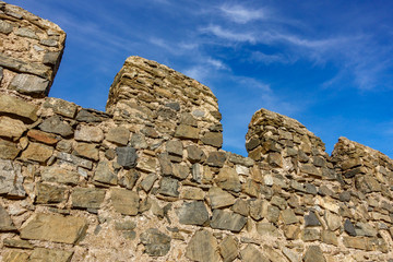 castle walls against blue sky