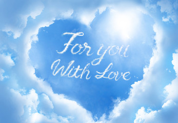 Naklejka na ściany i meble For you with love ,cloud calligraphy word inside heart cloud frame on blue sky background..
